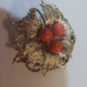 Elegant Gold and Coral Brooch